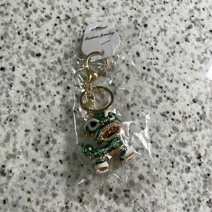 Brand new dragon key chain green and gold, in package.